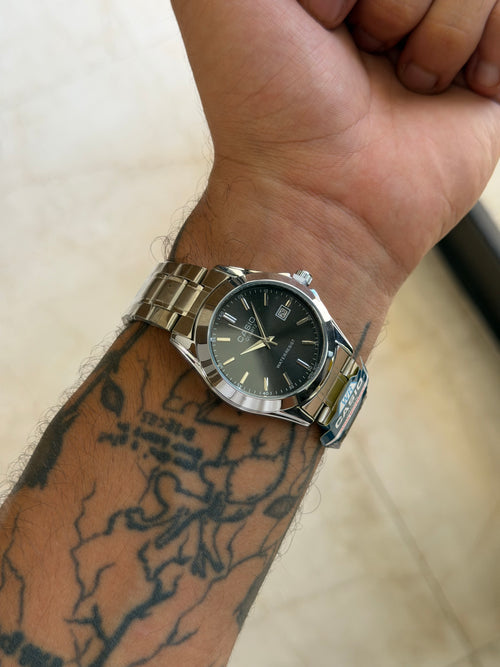 Casio rond argent noir
