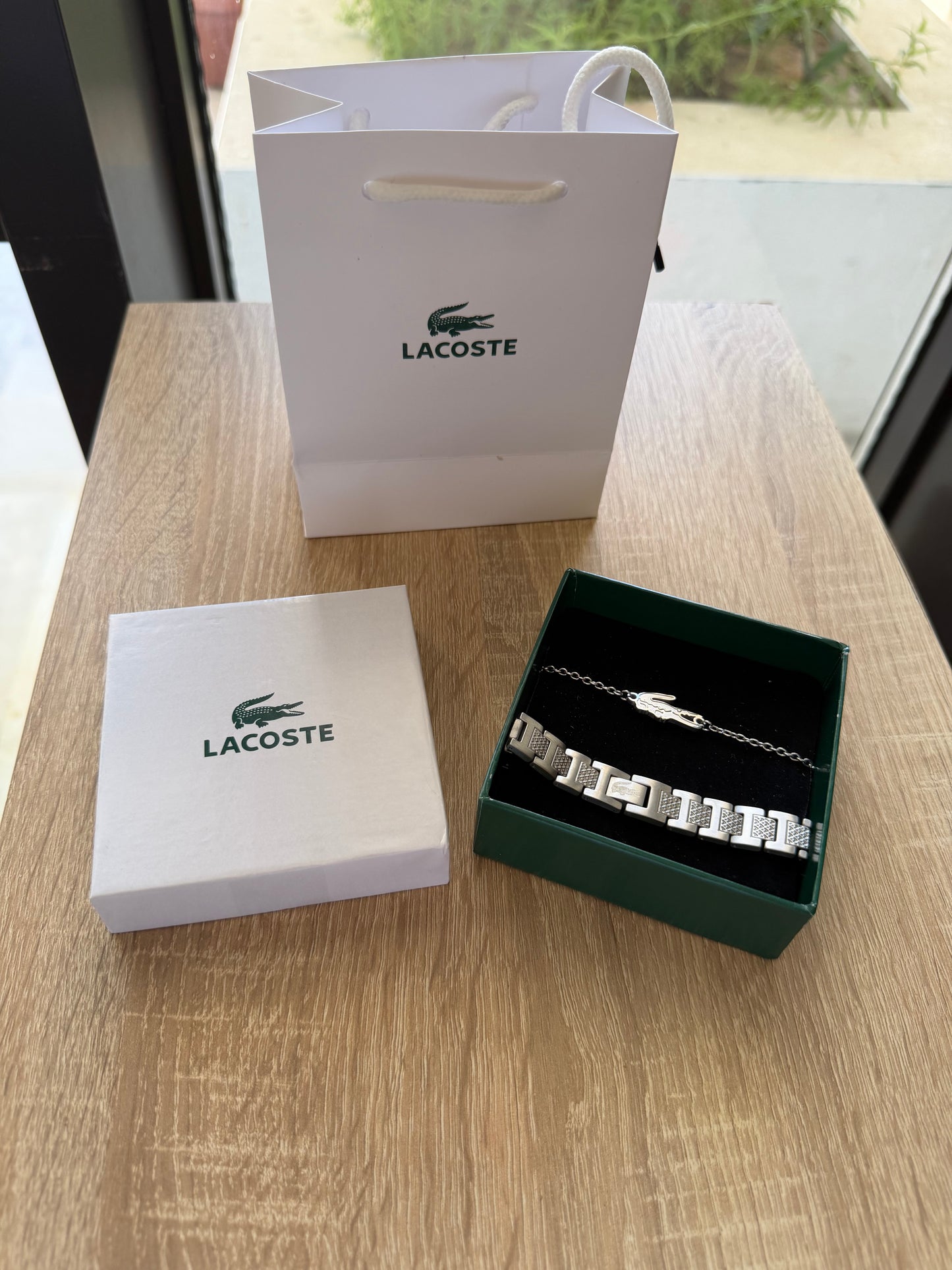 Deux bracelets Lacoste pour couple en acier inoxydable stanless steel matière
