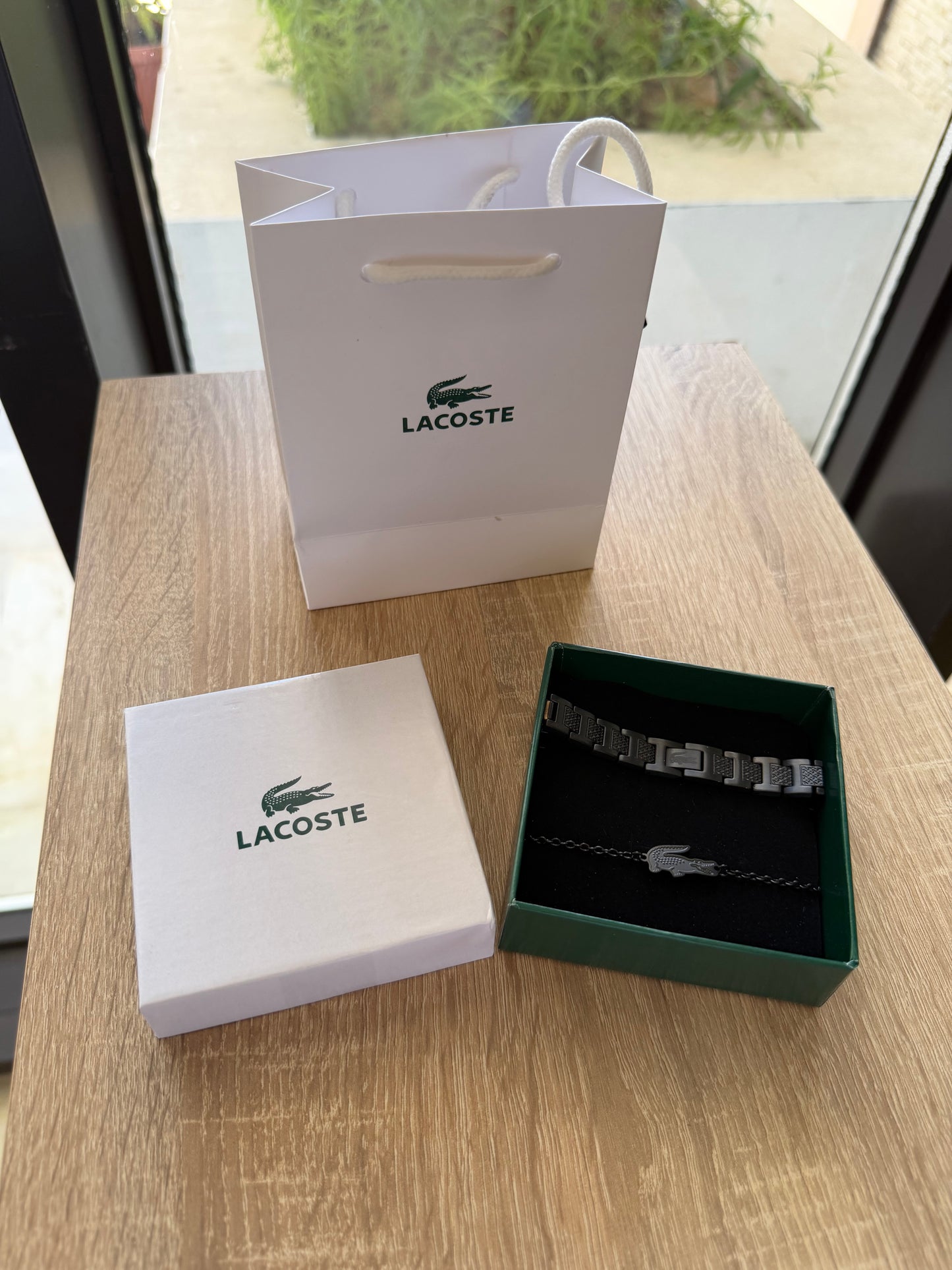 Deux bracelets acier inoxydable Lacoste en noir