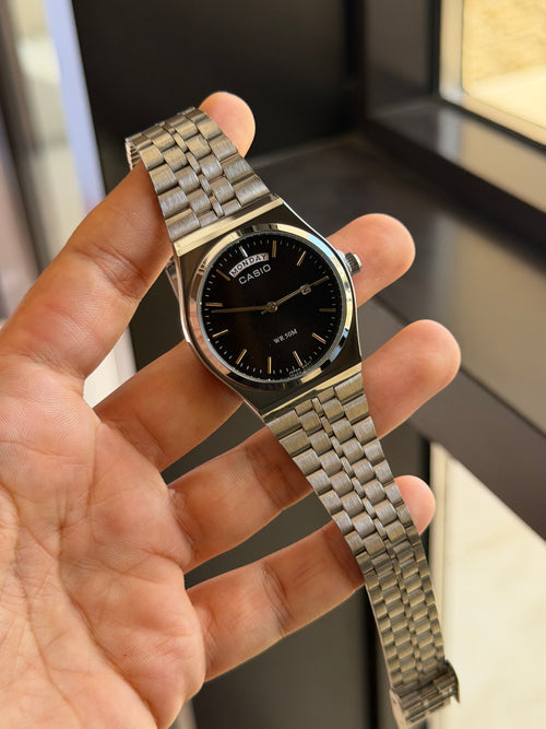 casio day date mtp b146 argent noir