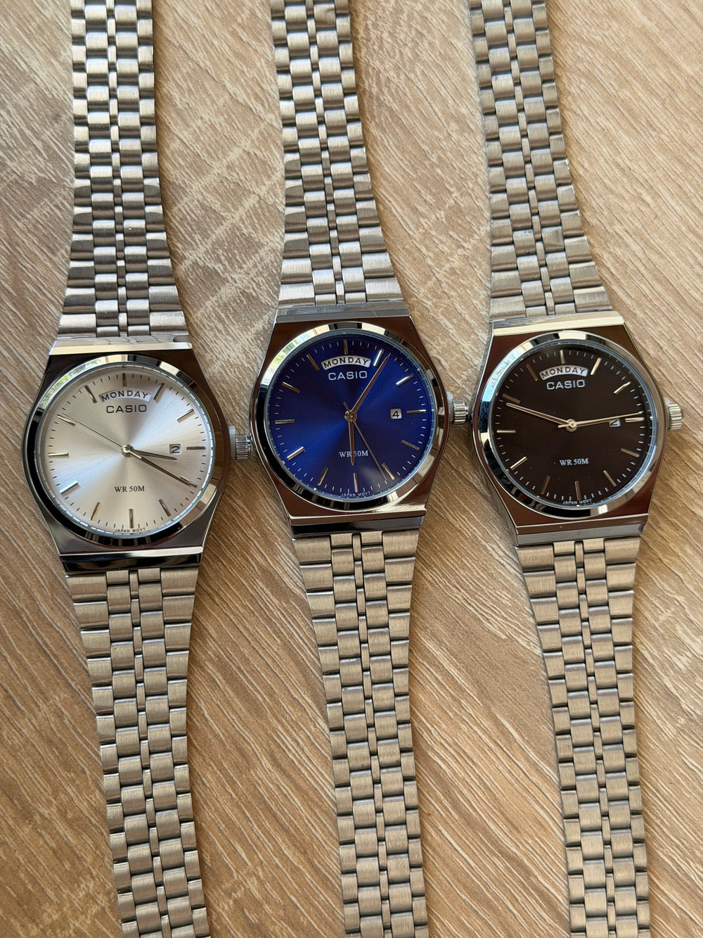 casio day date mtp b146 argent bleu