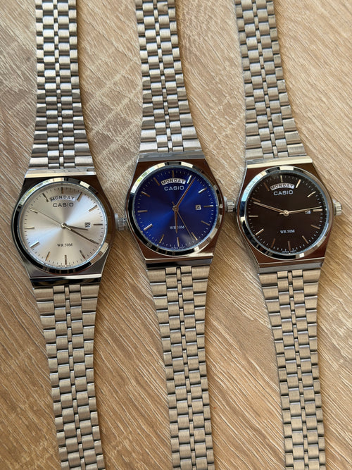 casio day date mtp b146 argent bleu