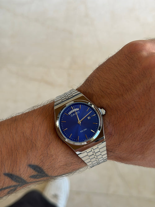 casio day date mtp b146 argent bleu