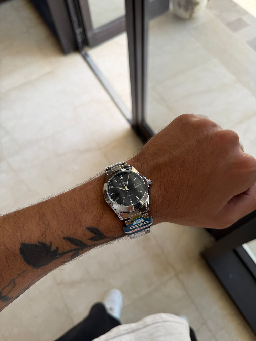 Casio rond argent noir