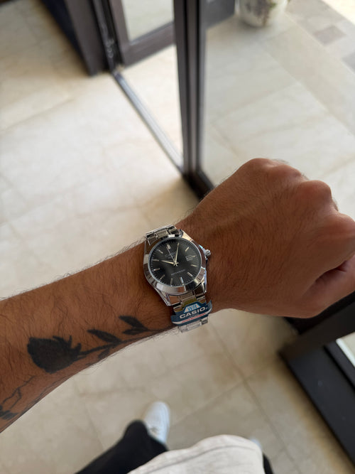 Casio rond argent noir