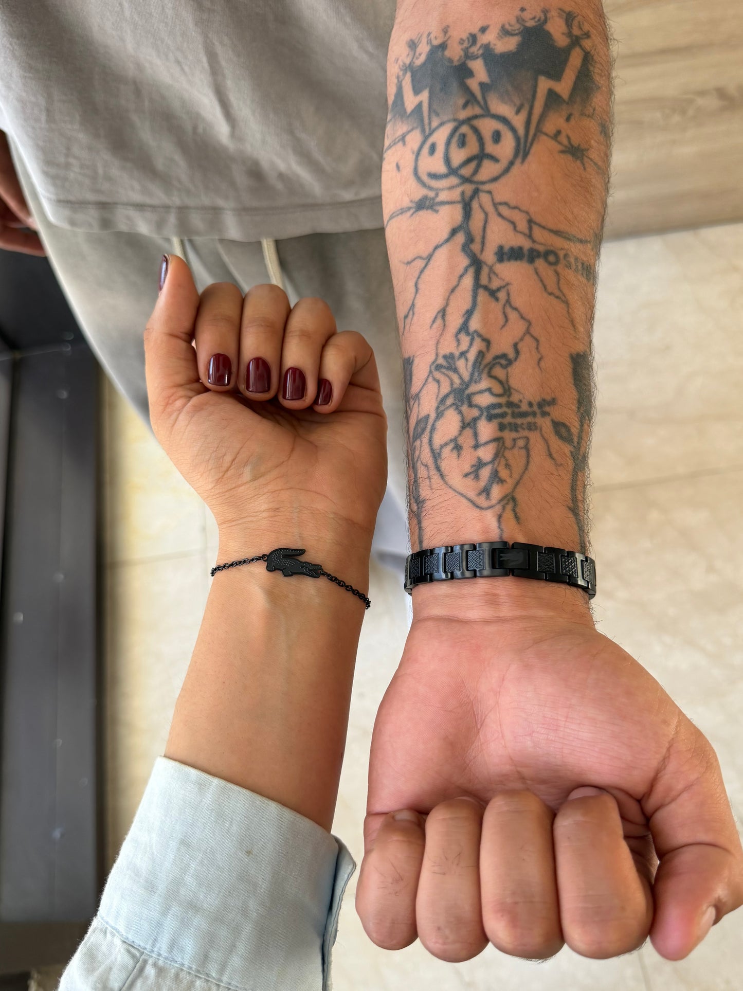 Deux bracelets acier inoxydable Lacoste en noir