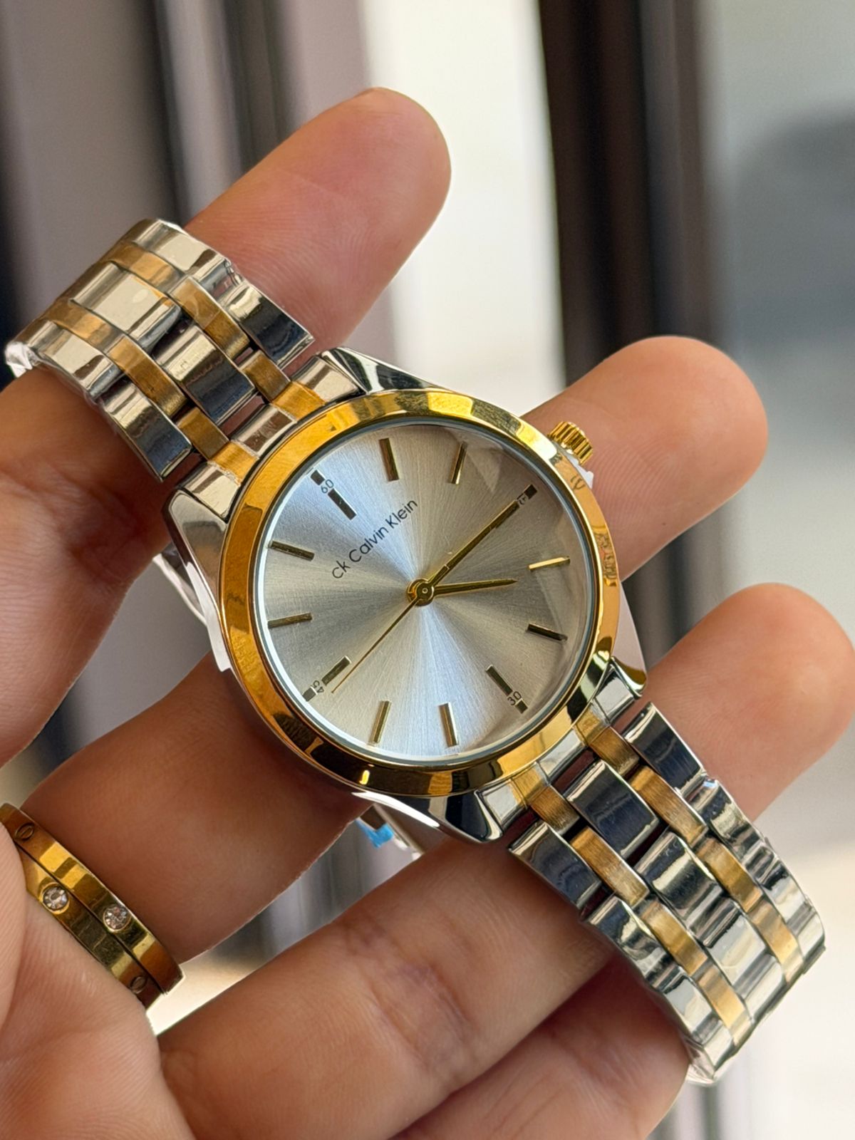 Calvin Klein Two-Tone Stainless Steel Watch – Silver Dial & Gold Bezel